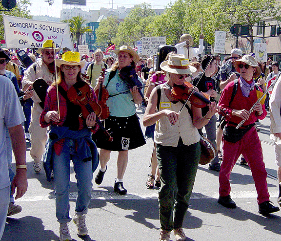 Fiddlers for Peace met 3-20-04 in Dolores Park to stop the war by playing Soldier's Joy and Whiskey Before Breakfast.