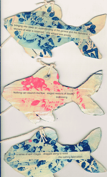 The poetry fish project - cardboard painted fish with sliced poetry hanging from trees. I make a fresh batch every year for the People's Park anniversary in the spring.